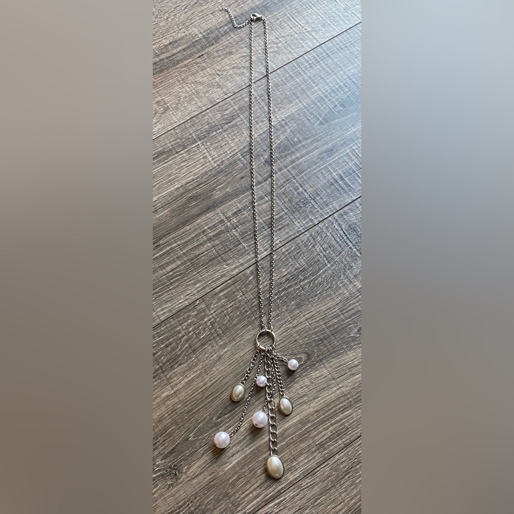 Spring Street silver toned long strand necklace with pearl accents